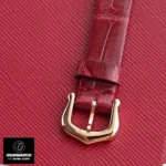 Detail of the leather strap and pin buckle on the Cartier Baignoire WJBA0031 watch dupe