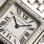 Panthère de Cartier ladies' watch W4PN0016 super clone with a diamond-set bezel and white dial, exuding timeless elegance.