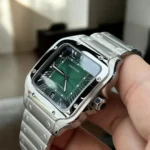 Super Clone Cartier Santos WSSA0062 Green Dial Watch - 45-degree angled view highlighting sunburst green dial and integrated bracelet.