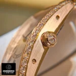 Octagonal crown detail - 18K rose gold plated case, diamond-set crown (6 mm diameter).