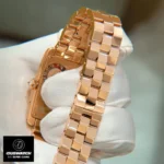 Articulated link construction - Rose gold-plated bracelet dupe with security push-button release mechanism