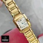 Three-quarter view of luxury-inspired Tank Française watch - Gold-plated rectangular case dupe with sunray-brushed silver-tone dial