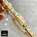 Side profile of Tank Française-style watch dupe - Showcasing 6.5mm slim gold-plated case construction with curved lugs