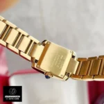 Caseback detail of medium-sized Cartier dupe watch - Stainless steel gold-plated back with "Cartier Paris" replica engravings