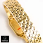 Solid 18k yellow gold bracelet detail on super clone timepiece, showcasing seamless link articulation and hidden clasp mechanism