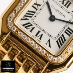 Close-up of the silvered dial and diamond-set bezel on the Panthere de Cartier WJPN0066 super clone watch, highlighting the blued-steel sword-shaped hands