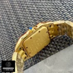 Detailed view of the case and crown of the Panthère de Cartier WGPN0031 super clone watch in yellow gold.