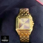 Front view of the Panthere de Cartier small model WGPN0031 super clone watch with a golden brown gradient dial and yellow gold bracelet.