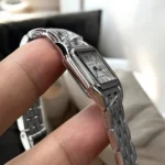 Side view of the Panthère de Cartier small model WSPN0013 watch dupe, emphasizing the slim profile of the stainless steel case.