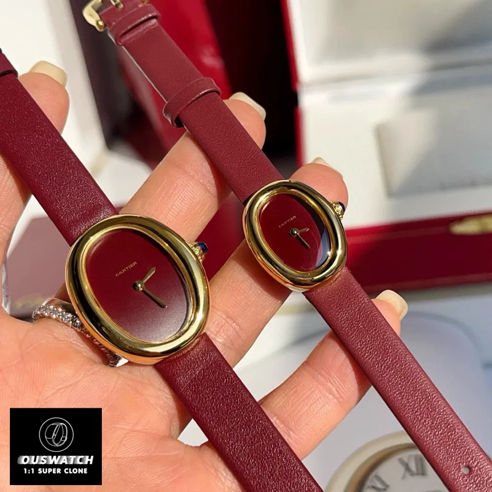 120-degree angle shot of two Cartier Baignoire Gold Ladies WGBA0040 watch dupes with red dials, highlighting their feminine charm and elegance.