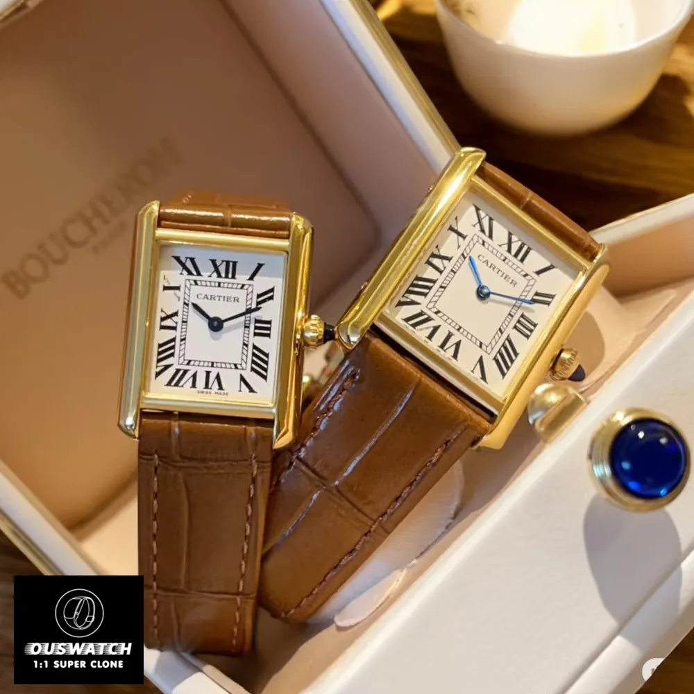 Twin set of Cartier Tank replica watches - Matching gold-plated timepieces displayed in velvet-lined storage case