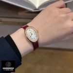 Model wearing the Cartier Baignoire WJBA0031 rose gold watch dupe, showcasing its elegance.