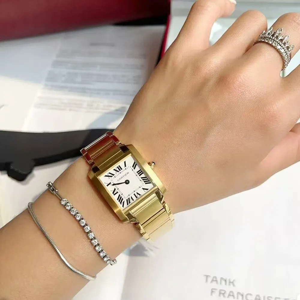 On-wrist demonstration of Cartier Tank Française dupe watch - Gold-plated alternative to luxury timepiece shown on female wrist