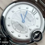 Close-up of the dial on the Cartier Ballon Bleu 33mm stainless steel watch dupe, showcasing its intricate details.