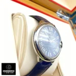 Close-up of the stainless steel case of the Cartier Ballon Bleu 42mm blue dial watch dupe, showcasing its polished finish