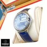 Detailed view of the case and crown of the Cartier Ballon Bleu 42mm blue dial WSBB0027 watch dupe