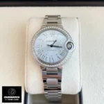 Front view of the Cartier Ballon Bleu watch dupe with blue dial and diamond bezel, model W4BB0028.