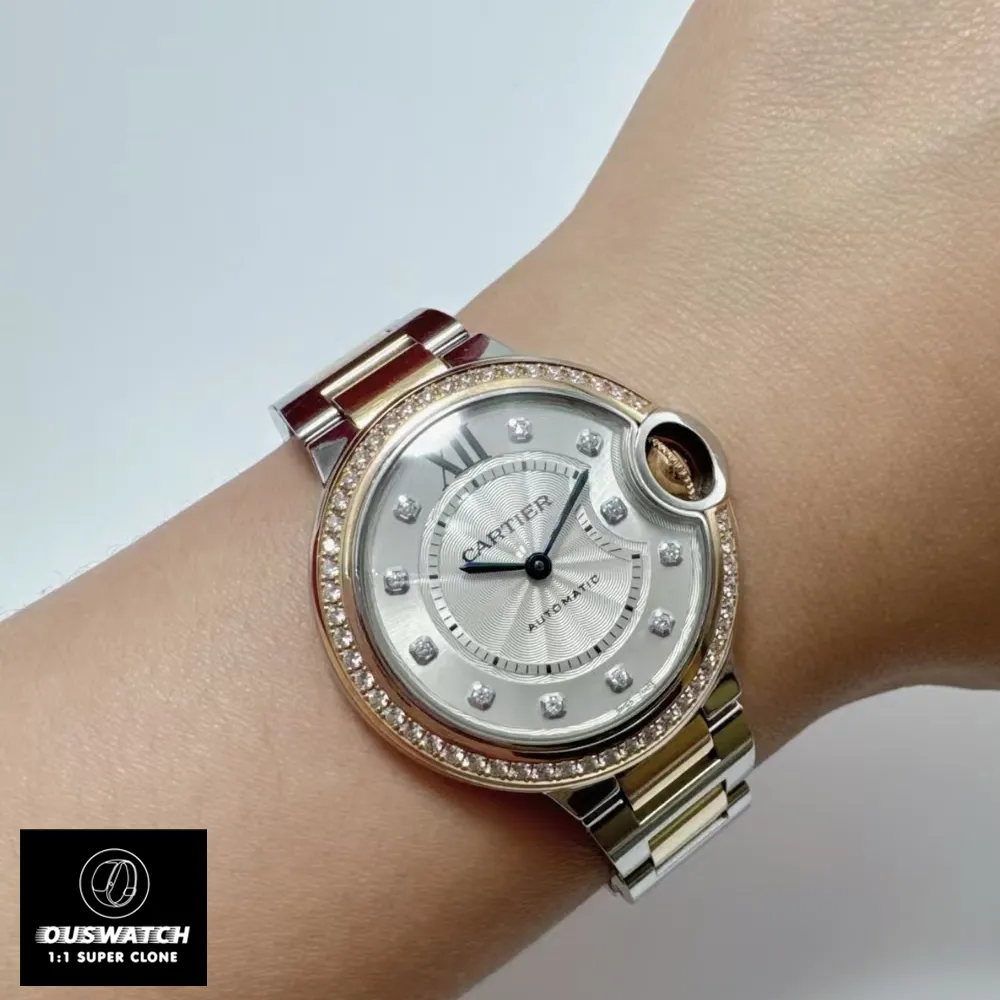 Wrist shot of diamond-set watch alternative featuring two-tone construction and sunray silver dial