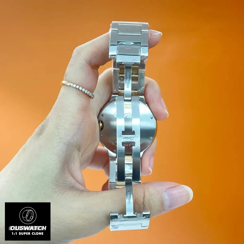 Close-up of the clasp on the Cartier Ballon Bleu two-tone watch dupe, model W3BB0023.