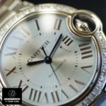 Another close-up of the blue dial on the Cartier Ballon Bleu W4BB0028 watch dupe, emphasizing the Roman numeral hour markers.