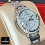 Cartier Ballon Bleu watch dupe featuring a diamond dial and stainless steel bracelet.