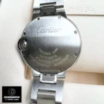 Detailed caseback view of automatic watch replica showing engraved serial number