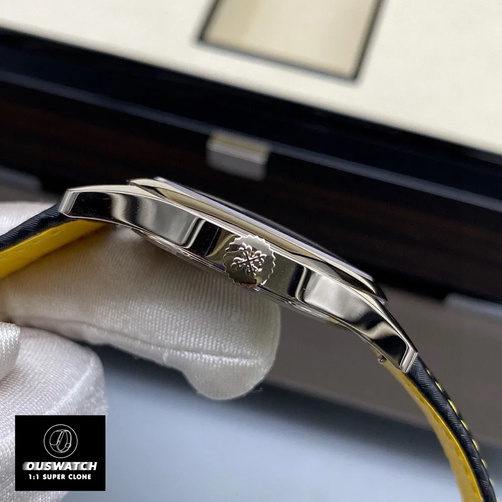 A close-up of the crown on the Patek Philippe Calatrava 6007G-001 white gold replica watch highlights the ridged edge and embossed logo