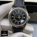 The Patek Philippe Calatrava 6007G-001 white gold replica watch is shown front-on, displaying its black dial with Arabic numerals hour markers.