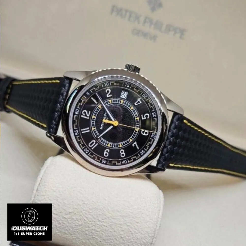 A side view of a Patek Philippe Calatrava 6007G-001 white gold replica watch lying horizontally in its open presentation box shows the black yellow dial and leather strap.