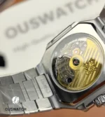 Rear case close-up of Patek Philippe Cubitus 5821/1a showcasing the mechanical movement.