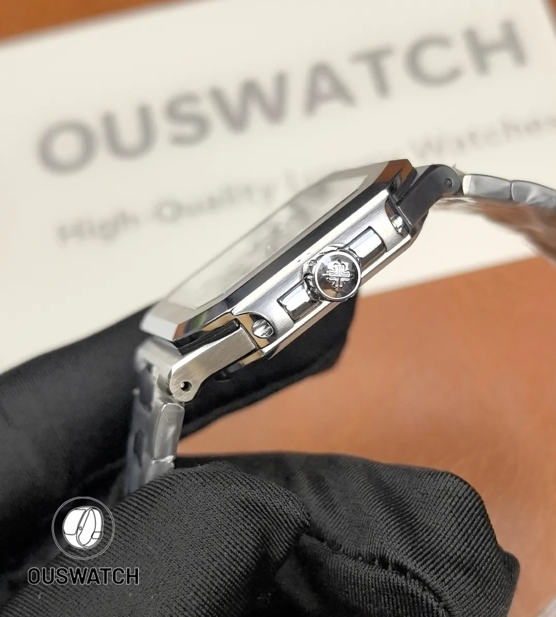 Close-up of the Patek Philippe Cubitus 5821/1a side crown with fine detailing.