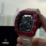 Red Richard Mille RM 35-02 watch featuring a white rubber strap