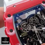 Close-up detail of the carbon fiber case on a Red Richard Mille watch