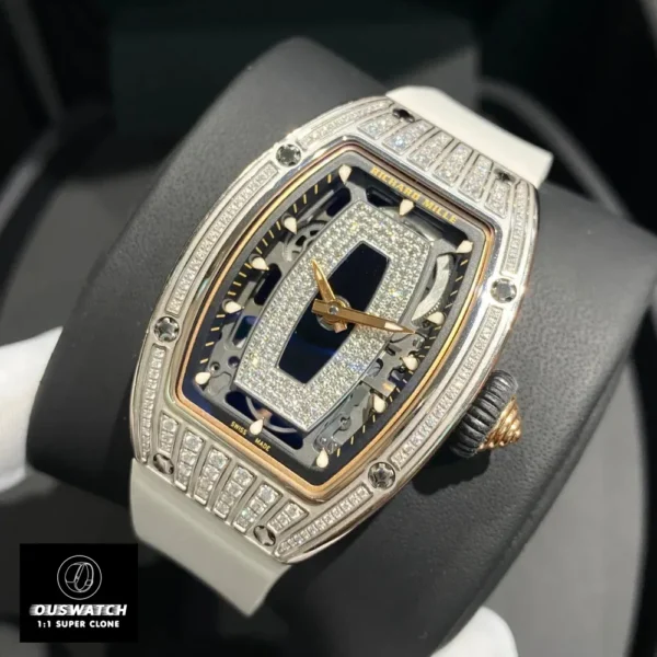 Replica iced out Richard Mille RM 07‑01 shown at a 45‑degree angle, illustrating the diamond‑encrusted case and refined Super Clone look.