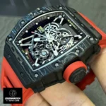 Replica Richard Mille watch showing the black TPT case and crown.