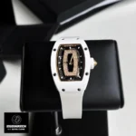 Straight‑on view of the Richard Mille RM 07 case and iced out diamond dial, capturing the Super Clone detail and luxury style.