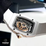 Detailed back case engraving of the Richard Mille RM 07-01 super clone watch with "RM 07-01" serial number and iced-out screw design
