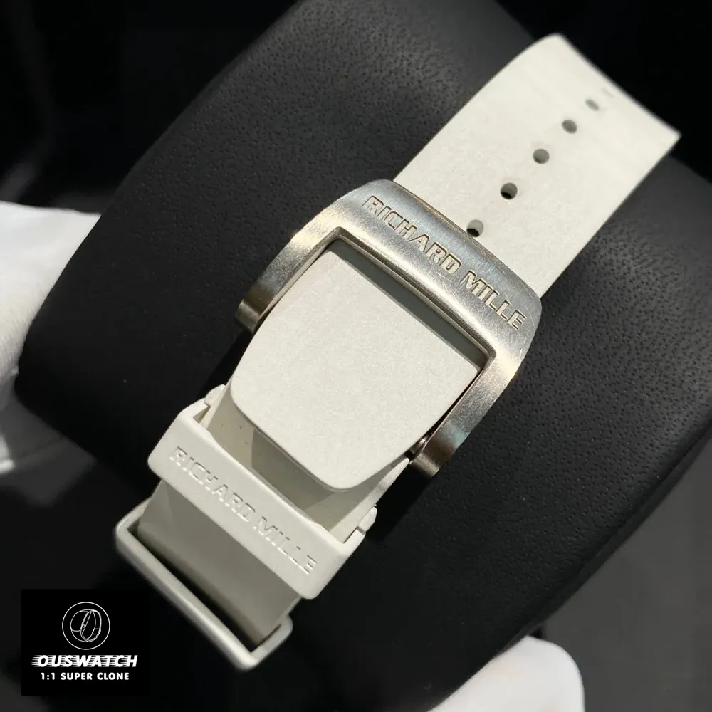 Richard Mille RM 07‑01 in white gold with white strap, featuring an iced out bezel and sleek super clone finish.