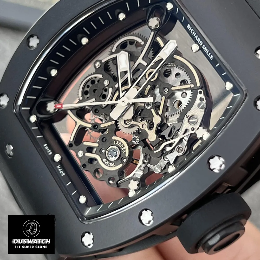 Detailed close-up of the transparent dial on the Richard Mille RM 055, revealing the complexity of its super clone design.