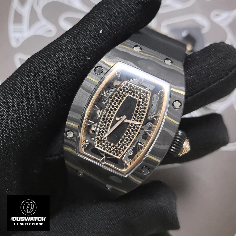 Complete view of the Richard Mille RM 07-01 ladies watch with rose gold case, showcasing its signature tonneau shape and intricate design elements. The warm rose gold tones contrast elegantly with the technical skeletonized dial, reflecting the brand’s fusion of luxury and horological innovation