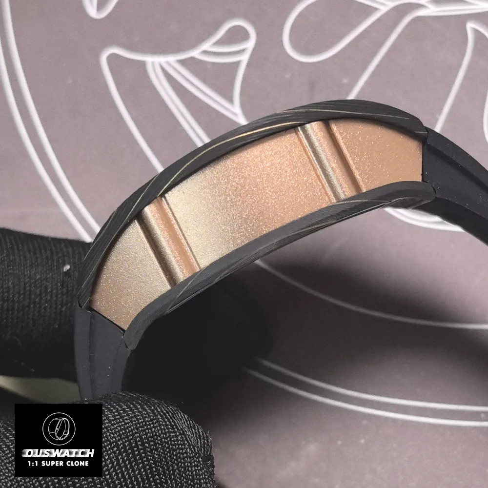 Detailed view of the RM 07-01’s rose gold case middle, showcasing the satin-finished surfaces and sharp anglage. The image highlights the precision machining required to integrate the Carbon TPT bezel with the precious metal components