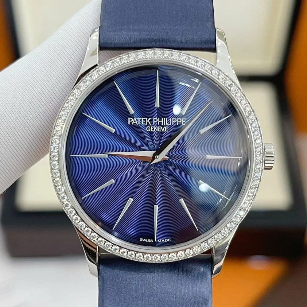 Front view of Patek Philippe Ladies Calatrava 4997/200G super clone watch with applied gold hour markers.