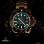 Low-light visibility demonstration of Rolex Deepsea 136660 Super Clone with Chromalight luminescent markers. Ensures readability in dark environments.