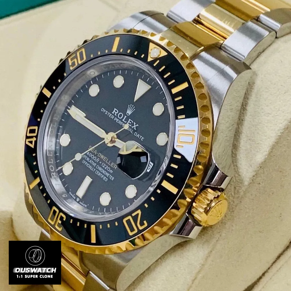 Close-up of unidirectional Cerachrom bezel and screw-down crown on 43mm two-tone Sea-Dweller 126603