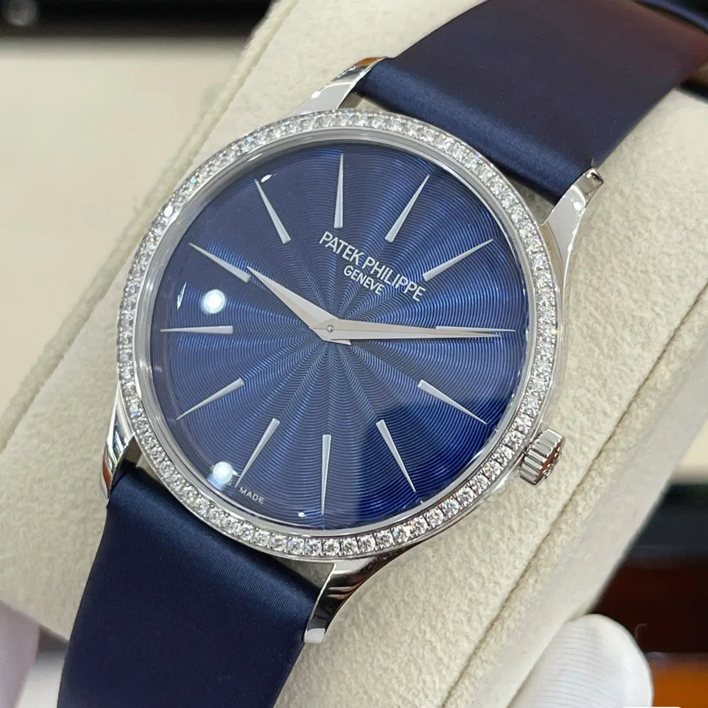 The Patek Philippe Calatrava 4997/200G Super Clone shown at a 75° angle, emphasizing the diamond bezel, smooth case contours, and elegant crown.