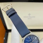 Detail shot of the genuine-style leather strap and polished pin-buckle clasp on the Patek Philippe Ladies Calatrava 4997/200G Super Clone.