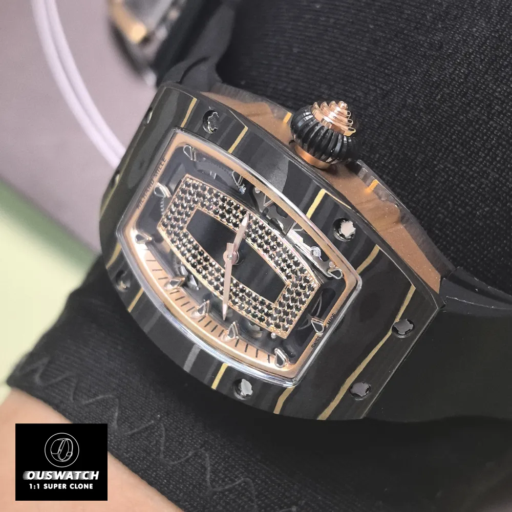 The RM 07-01 shown on a wrist, illustrating its ergonomic 45.66 x 31.40 mm dimensions. The curved caseback contours to the wrist, while the lightweight Carbon TPT construction ensures comfort during extended wear