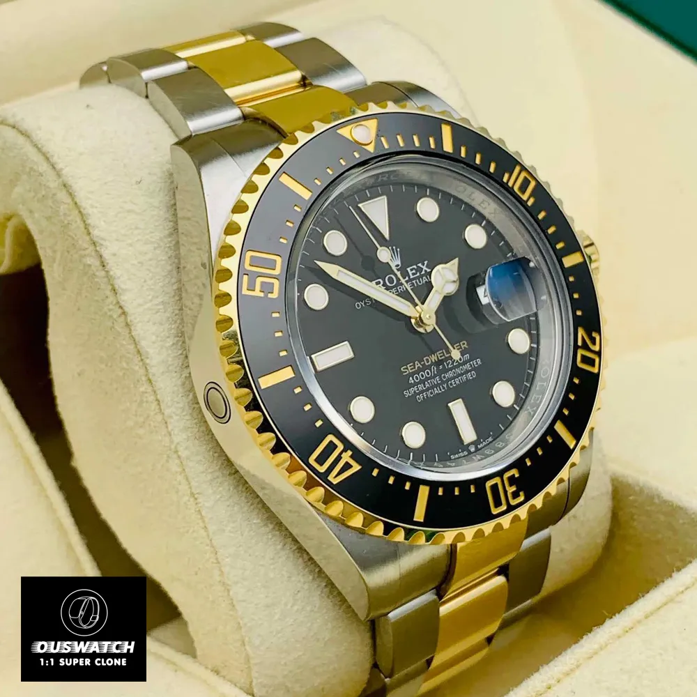 Angled view showing black Cerachrom bezel and helium escape valve on two-tone Deepsea case