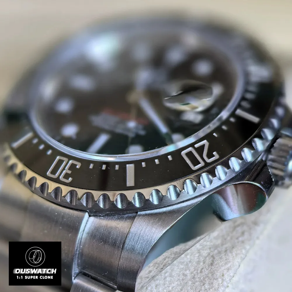 Close-up of Rolex Sea-Dweller 126600 904L Oystersteel case and Cerachrom bezel, showcasing brushed finish and anti-reflective sapphire crystal