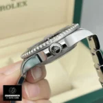 Side profile of Rolex Sea-Dweller 126600, showcasing screw-down crown and tapered case lugs